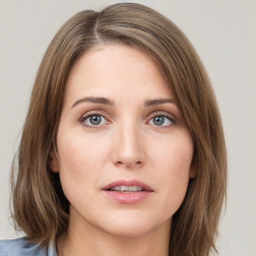 Neutral white young-adult female with medium  brown hair and grey eyes