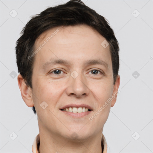 Joyful white adult male with short  brown hair and brown eyes