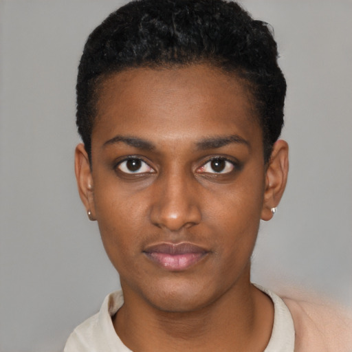 Neutral black young-adult female with short  black hair and brown eyes