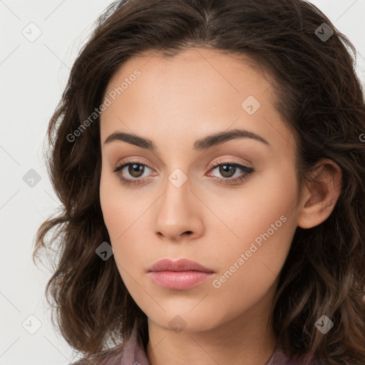 Neutral white young-adult female with long  brown hair and brown eyes