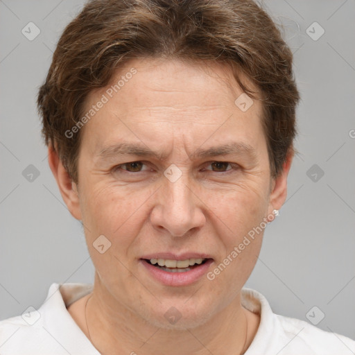 Joyful white adult male with short  brown hair and brown eyes