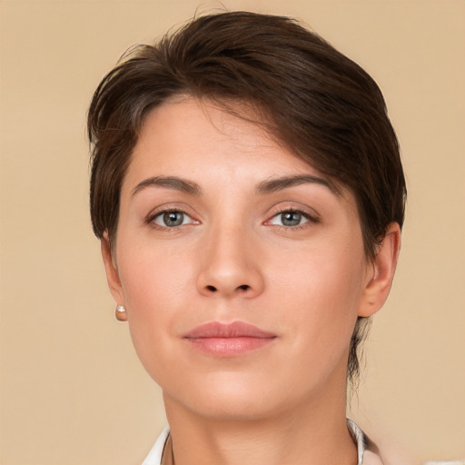 Neutral white young-adult female with short  brown hair and brown eyes