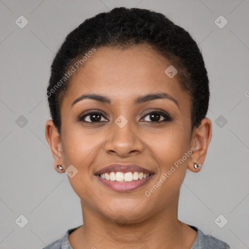 Joyful black young-adult female with short  brown hair and brown eyes