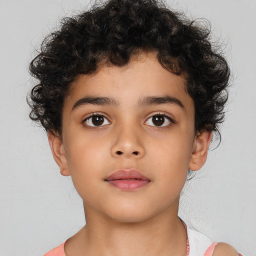 Neutral latino child male with short  brown hair and brown eyes