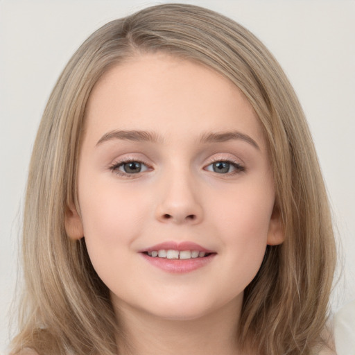 Joyful white child female with medium  brown hair and brown eyes