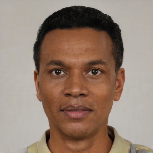 Neutral black young-adult male with short  black hair and brown eyes