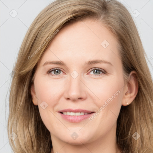 Joyful white young-adult female with long  brown hair and grey eyes