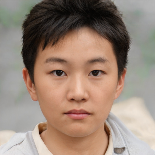 Neutral asian young-adult male with short  brown hair and brown eyes