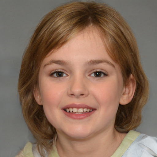 Joyful white child female with medium  brown hair and blue eyes