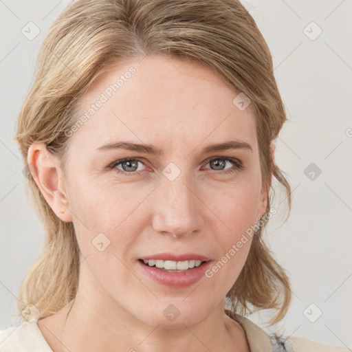 Joyful white young-adult female with medium  brown hair and blue eyes