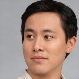 Neutral asian young-adult male with short  brown hair and brown eyes