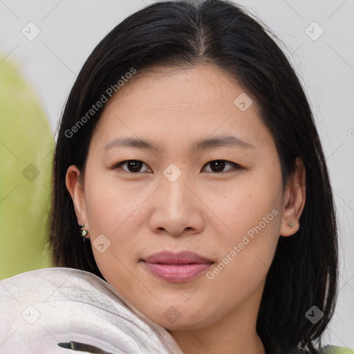 Joyful asian young-adult female with medium  brown hair and brown eyes