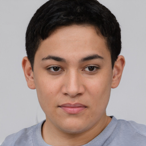 Joyful asian young-adult female with short  black hair and brown eyes