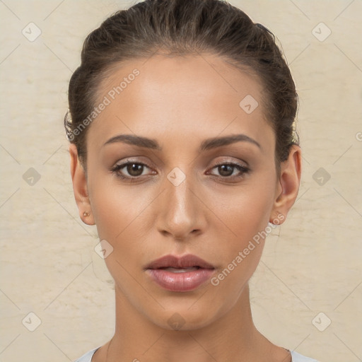 Neutral white young-adult female with short  brown hair and brown eyes