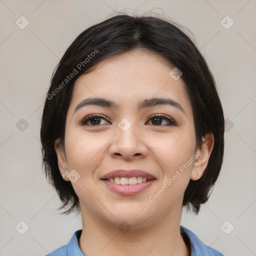 Joyful asian young-adult female with medium  black hair and brown eyes