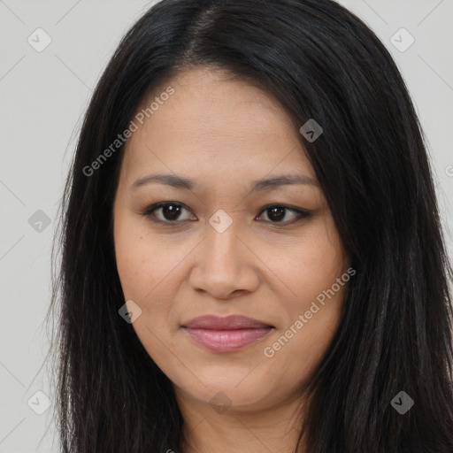 Joyful latino young-adult female with long  brown hair and brown eyes