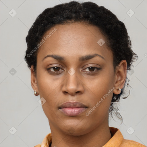 Neutral black young-adult female with short  black hair and brown eyes