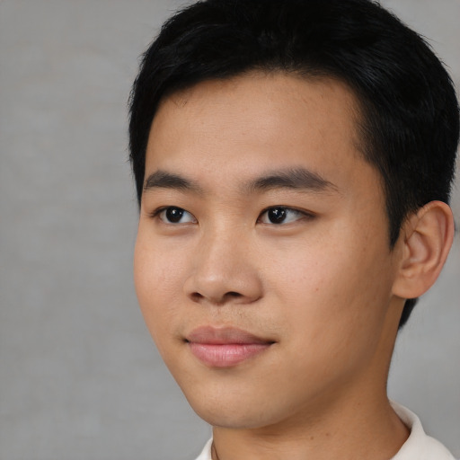 Neutral asian young-adult male with short  black hair and brown eyes