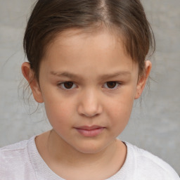 Neutral white child female with short  brown hair and brown eyes