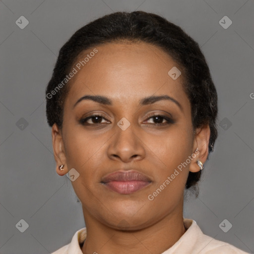 Joyful latino young-adult female with short  brown hair and brown eyes