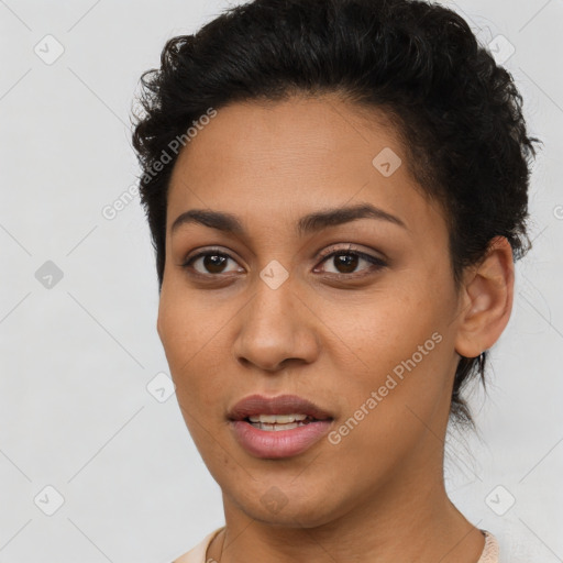 Joyful latino young-adult female with short  brown hair and brown eyes