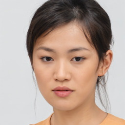 Neutral asian young-adult female with medium  brown hair and brown eyes