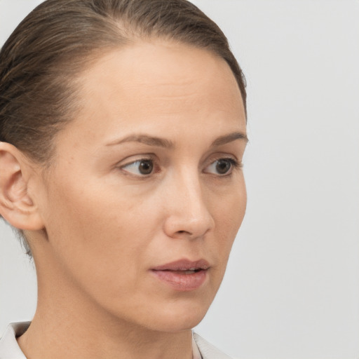 Neutral white young-adult female with short  brown hair and brown eyes