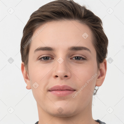 Joyful white young-adult female with short  brown hair and grey eyes