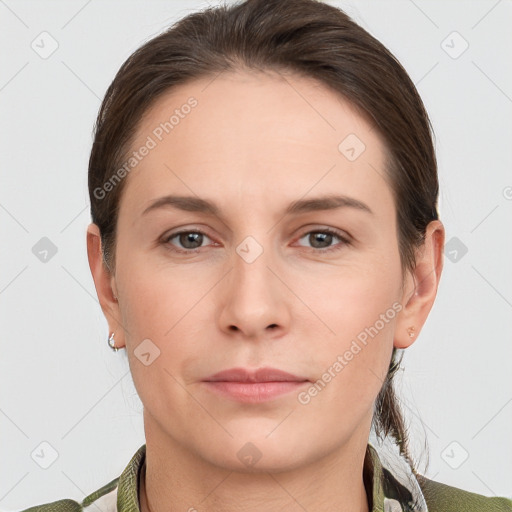 Neutral white young-adult female with short  brown hair and grey eyes