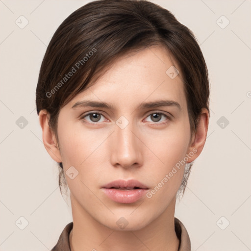 Neutral white young-adult female with short  brown hair and grey eyes