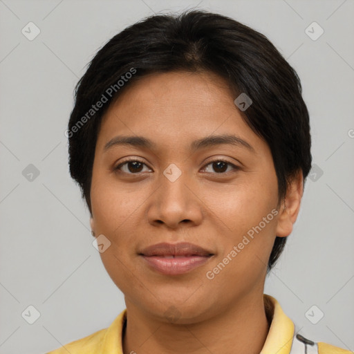 Joyful latino young-adult female with short  brown hair and brown eyes