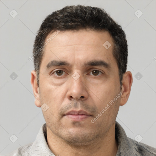 Neutral white adult male with short  brown hair and brown eyes