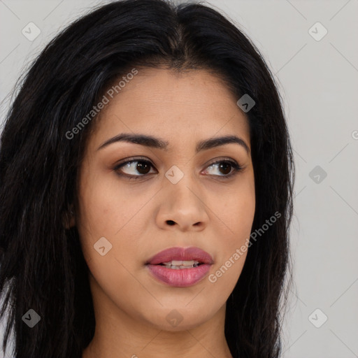 Joyful asian young-adult female with long  brown hair and brown eyes