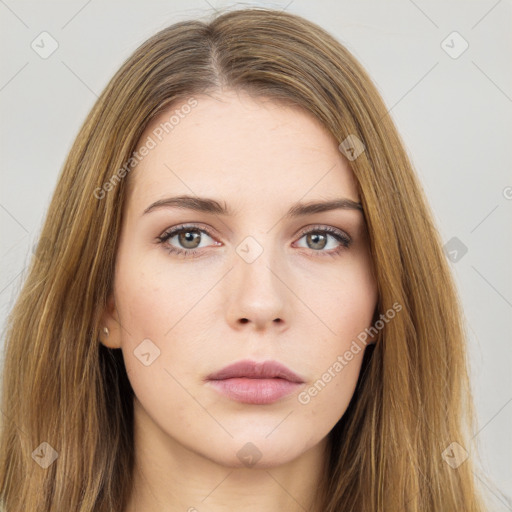 Neutral white young-adult female with long  brown hair and brown eyes