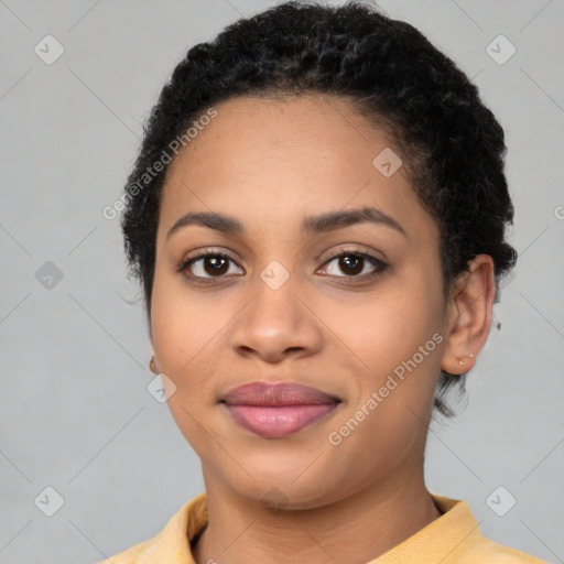 Joyful latino young-adult female with short  black hair and brown eyes