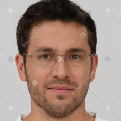 Joyful white adult male with short  brown hair and brown eyes