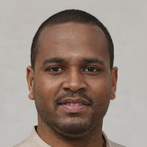 Neutral latino young-adult male with short  brown hair and brown eyes
