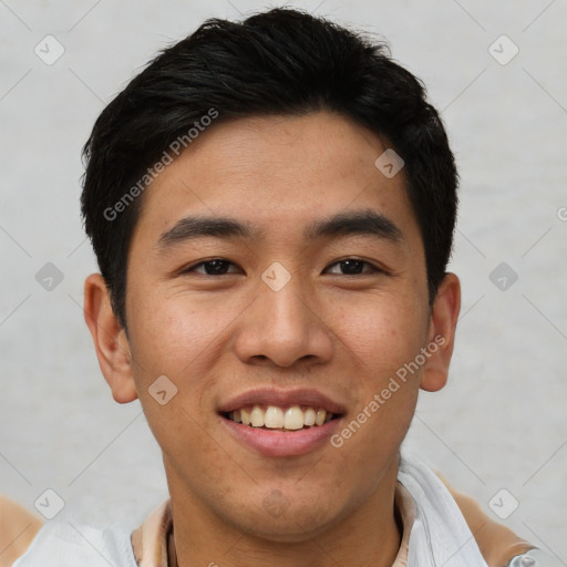 Joyful asian young-adult male with short  black hair and brown eyes