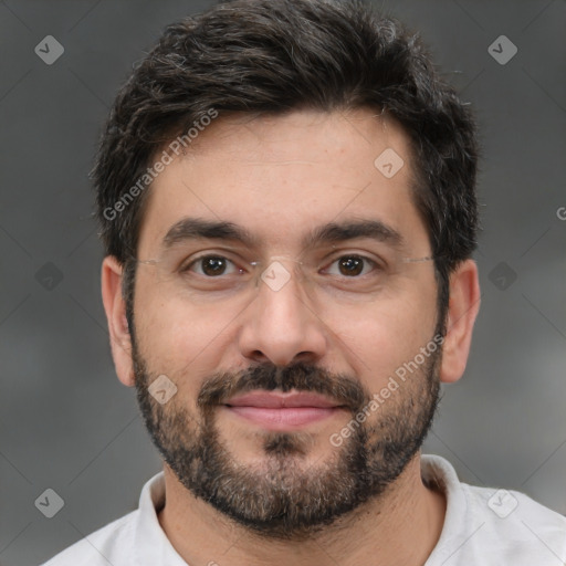 Joyful white adult male with short  brown hair and brown eyes