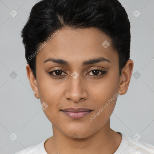 Joyful latino young-adult female with short  black hair and brown eyes
