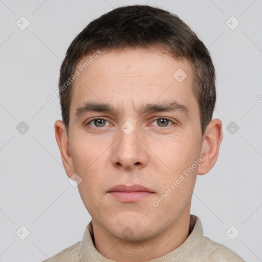 Neutral white young-adult male with short  brown hair and brown eyes