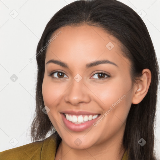 Joyful white young-adult female with long  brown hair and brown eyes