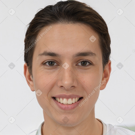 Joyful white young-adult female with short  brown hair and brown eyes