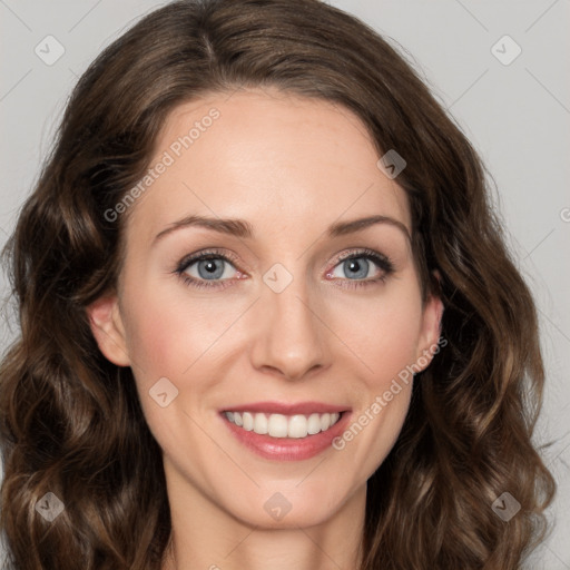 Joyful white young-adult female with medium  brown hair and green eyes