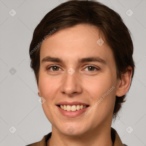 Joyful white young-adult female with medium  brown hair and grey eyes