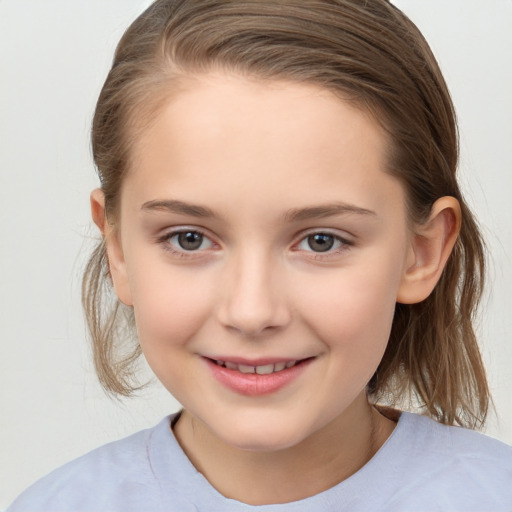 Joyful white child female with medium  brown hair and grey eyes