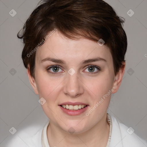 Joyful white young-adult female with short  brown hair and grey eyes