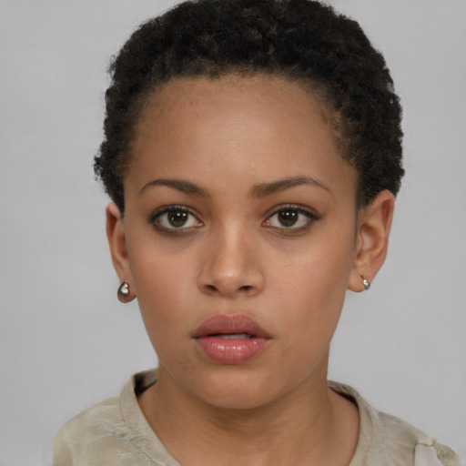 Neutral black young-adult female with short  brown hair and brown eyes