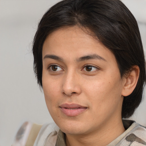 Neutral white young-adult female with medium  brown hair and brown eyes