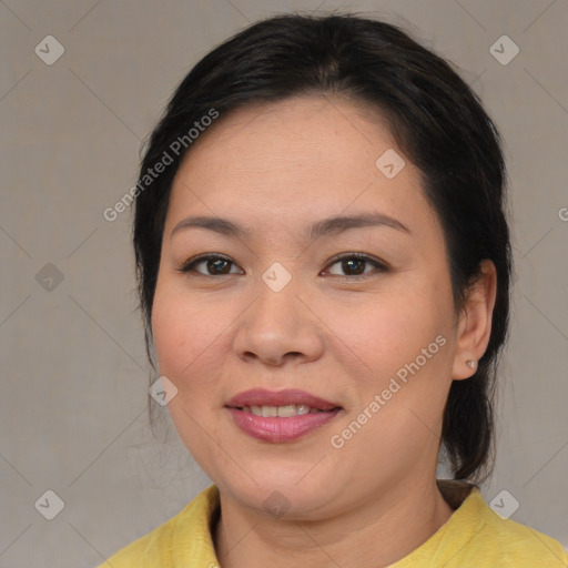 Joyful asian young-adult female with medium  brown hair and brown eyes